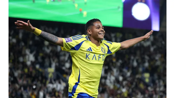 RIYADH, SAUDI ARABIA - DECEMBER 02: Wesley of Al-Nassr celebrates his team's first goal, an own goal scored by Romain Saiss of Al-Sadd during the AFC Champions League Elite match between Al-Nassr and Al-Sadd at King Saud University Stadium on December 02, 2024 in Riyadh, Saudi Arabia. (Photo by Abdullah Ahmed/Getty Images)
