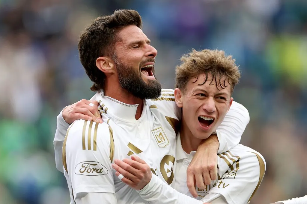 SEATTLE, WASHINGTON – MARCH 08: Olivier Giroud #9 celebrates a goal by Nathan Ordaz #27 of Los Angeles FC during the first half against the Seattle Sounders at Lumen Field on March 08, 2025 in Seattle, Washington. (Photo by Steph Chambers/Getty Images)