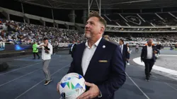 RIO DE JANEIRO, BRAZIL - FEBRUARY 27: President of CONMEBOL Alejandro Dominguez approaches the stands to girft a ball to fans prior to the Recopa Sudamericana 2025 Second Leg match between Botafogo and Racing Club at Estadio Olímpico Nilton Santos on February 27, 2025 in Rio de Janeiro, Brazil. (Photo by Wagner Meier/Getty Images)