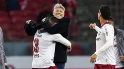 Renato Gaúcho comemora vitória com Tiago Silva - Foto: Pedro H. Tesch/Getty Images