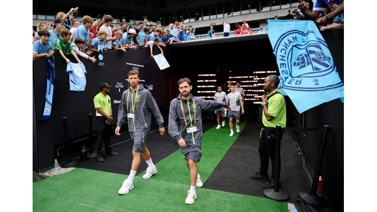 PHILADELPHIA, PENNSYLVANIA - JUNE 18: Ruben Dias #3 and Bernardo Silva #20 of Manchester City walk onto the pitch prior to the FIFA Club World Cup 2025 group G match between Manchester City FC and Wydad AC at Lincoln Financial Field on June 18, 2025 in Philadelphia, Pennsylvania. (Photo by David Ramos/Getty Images)