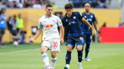 CINCINNATI, OHIO - JUNE 18: Oscar Gloukh #30 of FC Salzburg passes the ball as he is pressured by Alexei Dominguez #12 of CF Pachuca during the FIFA Club World Cup 2025 group H match between CF Pachuca and FC Salzburg at TQL Stadium on June 18, 2025 in Cincinnati, Ohio. (Photo by Dylan Buell/Getty Images)