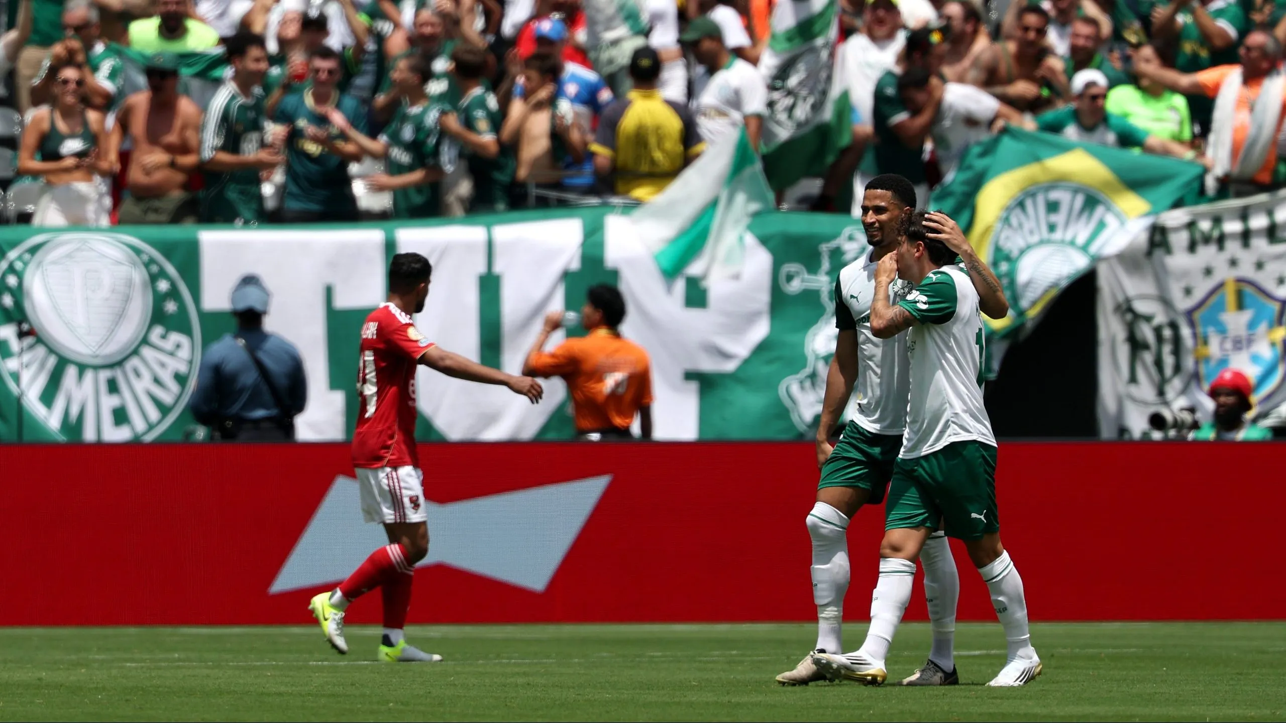 EAST RUTHERFORD, NEW JERSEY – JUNE 19: Murilo Cerqueira and Mauricio #18 of Palmeiras celebrate after Wessam Abou Ali #9 of Al Ahly FC (not pictured) scores a own goal and Palmeiras first during the FIFA Club World Cup 2025 group A match between SE Palmeiras and Al Ahly SC at MetLife Stadium on June 19, 2025 in East Rutherford, New Jersey. (Photo by Al Bello/Getty Images)