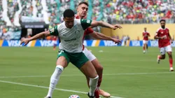 EAST RUTHERFORD, NEW JERSEY - JUNE 19: Murilo Cerqueira #26 of Palmeiras is challenged by Nejc Gradisar #10 of Al Ahly FC during the FIFA Club World Cup 2025 group A match between SE Palmeiras and Al Ahly SC at MetLife Stadium on June 19, 2025 in East Rutherford, New Jersey. (Photo by Al Bello/Getty Images)