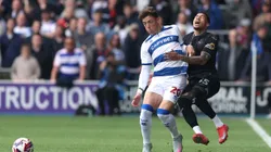 LONDON, ENGLAND - APRIL 21: Reggie Cannon of Queens Park Rangers fouls Ronald of Swansea City during the Sky Bet Championship match between Queens Park Rangers FC and Swansea City AFC at Loftus Road on April 21, 2025 in London, England. (Photo by Warren Little/Getty Images)