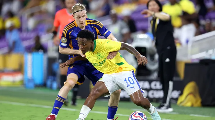 ORLANDO, FLORIDA - JUNE 17: Lucas Ribeiro #10 of Mamelodi Sundowns FC is challenged by Gustav Ludwigson #17 of Ulsan HD during the FIFA Club World Cup 2025 group F match between Ulsan HD FC and Mamelodi Sundowns FC at Inter&Co Stadium on June 17, 2025 in Orlando, Florida. (Photo by Megan Briggs/Getty Images)