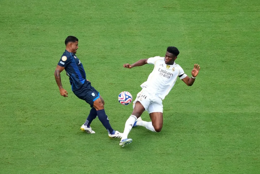 CHARLOTTE, NORTH CAROLINA – JUNE 22: Aurelien Tchouameni #14 of Real Madrid C.F. battles for possession with John Kennedy #10 of CF Pachuca during the FIFA Club World Cup 2025 group H match between Real Madrid CF and CF Pachuca at Bank of America Stadium on June 22, 2025 in Charlotte, North Carolina. (Photo by Michael Owens/Getty Images)