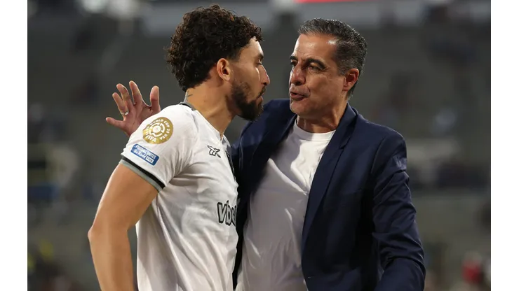 PASADENA, CALIFORNIA - JUNE 19: Botafogo FR Head Coach Renato Paiva celebrates victory with Alex Telles after the FIFA Club World Cup 2025 group B match between Paris Saint-Germain FC and Botafogo FR at Rose Bowl Stadium on June 19, 2025 in Pasadena, California. (Photo by Stu Forster/Getty Images)