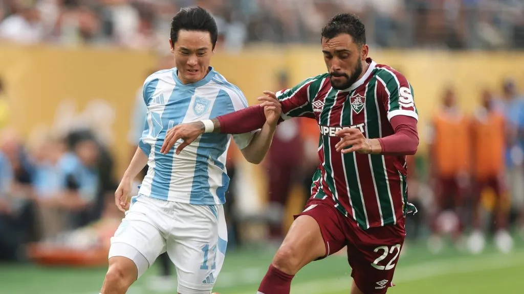 EAST RUTHERFORD, NEW JERSEY – JUNE 21: Juan Freytes #22 of Fluminense FC is challenged by Um Wonsang #11 of Ulsan HD during the FIFA Club World Cup 2025 group F match between Fluminense FC and Ulsan HD FC at MetLife Stadium on June 21, 2025 in East Rutherford, New Jersey. (Photo by Francois Nel/Getty Images)