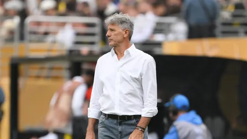Treinador durante partida no Mundial. Photo by David Ramos/Getty Images