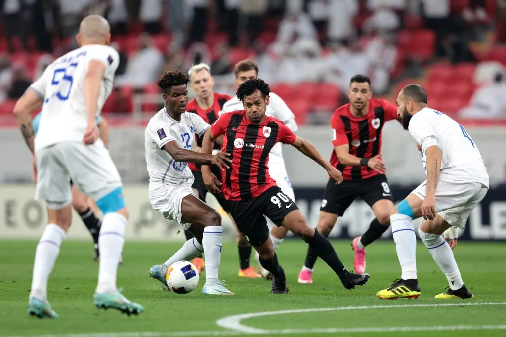 AL RAYYAN, QATAR – FEBRUARY 18: Romarinho of Al-Rayyan is challenged by Ibrahim Ndong of Esteghlal during the AFC Champions League Elite match between Al-Rayyan and Esteghlal at Ahmad bin Ali Stadium on February 18, 2025 in Al Rayyan, Qatar. (Photo by Mohamed Farag/Getty Images)