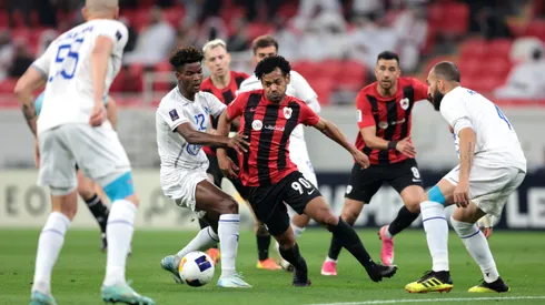 AL RAYYAN, QATAR - FEBRUARY 18: Romarinho of Al-Rayyan is challenged by Ibrahim Ndong of Esteghlal during the AFC Champions League Elite match between Al-Rayyan and Esteghlal at Ahmad bin Ali Stadium on February 18, 2025 in Al Rayyan, Qatar. (Photo by Mohamed Farag/Getty Images)