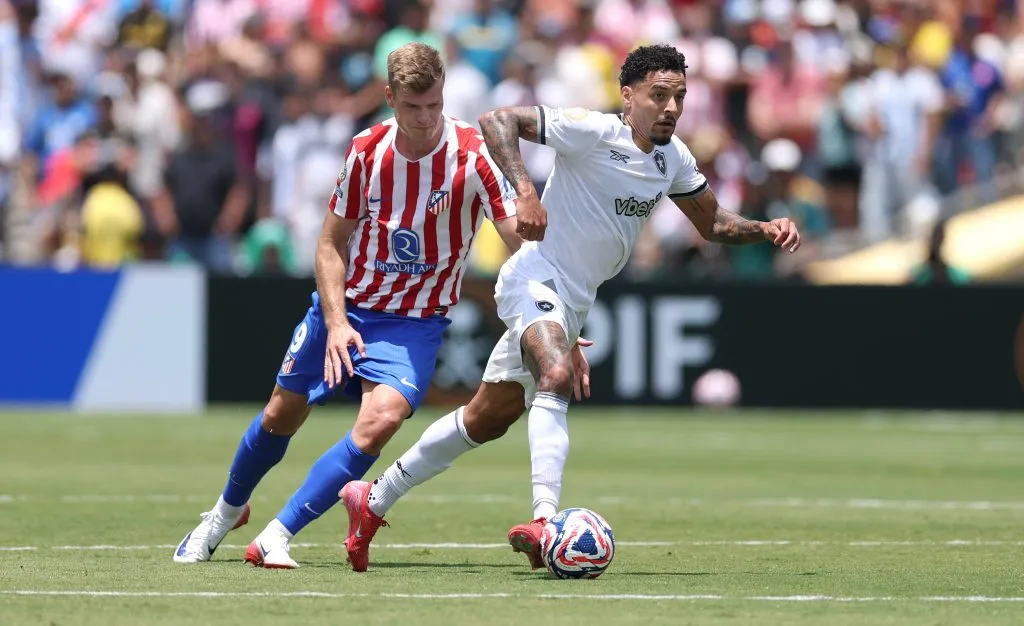 PASADENA, CALIFORNIA – JUNE 23: Botafogo player Gregore holds off the challenge of Alexander Sorloth of Atletico during the FIFA Club World Cup 2025 group B match between Club Atletico de Madrid and Botafogo FR at Rose Bowl Stadium on June 23, 2025 in Pasadena, California. (Photo by Stu Forster/Getty Images)