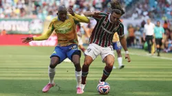 MIAMI GARDENS, FLORIDA - JUNE 25: Agustin Canobbio #17 of Fluminense FC is challenged by Khuliso Mudau #25 of Mamelodi Sundowns FC during the FIFA Club World Cup 2025 group F match between Mamelodi Sundowns FC and Fluminense FC at Hard Rock Stadium on June 25, 2025 in Miami Gardens, Florida. (Photo by Megan Briggs/Getty Images)