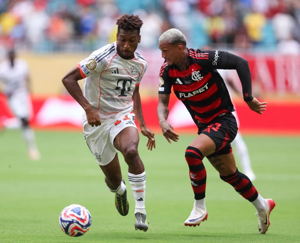 MIAMI GARDENS, FLORIDA – JUNE 29: Kingsley Coman #11 of FC Bayern Munchen runs with the ball while under pressure from Wesley #43 of CR Flamengo during the FIFA Club World Cup 2025 round of 16 match between CR Flamengo and FC Bayern München at Hard Rock Stadium on June 29, 2025 in Miami Gardens, Florida. (Photo by Megan Briggs/Getty Images)
