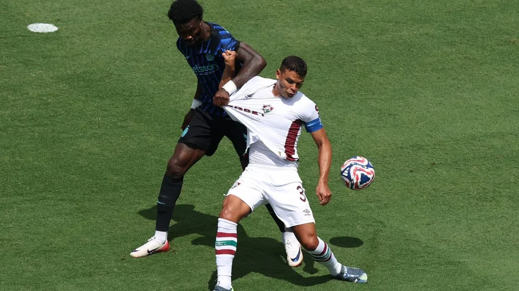 CHARLOTTE, NORTH CAROLINA – JUNE 30: Thiago Silva #3 of Fluminense FC is challenged by Marcus Thuram #9 of FC Internazionale Milano during the FIFA Club World Cup 2025 round of 16 match between FC Internazionale Milano and Fluminense FC at Bank of America Stadium on June 30, 2025 in Charlotte, North Carolina. (Photo by Buda Mendes/Getty Images)