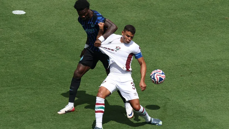 CHARLOTTE, NORTH CAROLINA - JUNE 30: Thiago Silva #3 of Fluminense FC is challenged by Marcus Thuram #9 of FC Internazionale Milano during the FIFA Club World Cup 2025 round of 16 match between FC Internazionale Milano and Fluminense FC at Bank of America Stadium on June 30, 2025 in Charlotte, North Carolina. (Photo by Buda Mendes/Getty Images)
