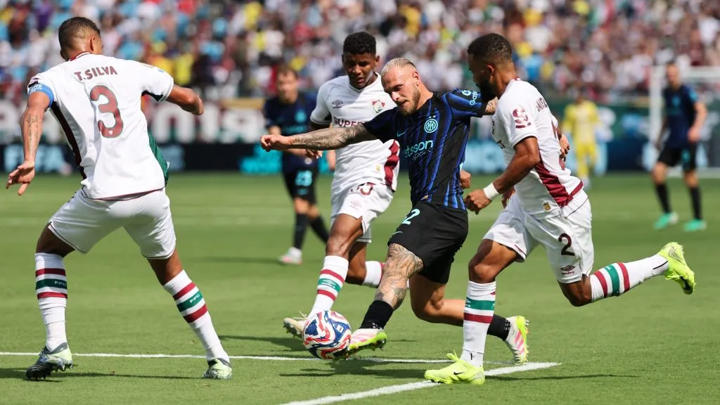 CHARLOTTE, NORTH CAROLINA – JUNE 30: Federico Dimarco #32 of FC Internazionale Milano controls the ball while under pressure from Samuel Xavier #2, Thiago Silva #3, and Hercules #35 of Fluminense FC during the FIFA Club World Cup 2025 round of 16 match between FC Internazionale Milano and Fluminense FC at Bank of America Stadium on June 30, 2025 in Charlotte, North Carolina. (Photo by Michael Reaves/Getty Images)