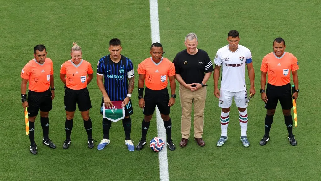 CHARLOTTE, NORTH CAROLINA – JUNE 30: Lautaro Martinez #10 of FC Internazionale Milano and Thiago Silva #3 of Fluminense FC pose for a photo alongside match officials prior to the FIFA Club World Cup 2025 round of 16 match between FC Internazionale Milano and Fluminense FC at Bank of America Stadium on June 30, 2025 in Charlotte, North Carolina. (Photo by Buda Mendes/Getty Images)