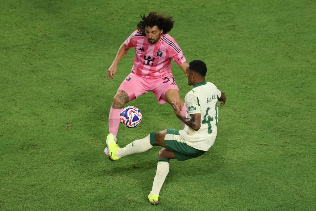 MIAMI GARDENS, FLORIDA – JUNE 23: Allan #40 of Palmeiras crosses the ball against Maximiliano Falcon #37 of Inter Miami CF during the FIFA Club World Cup 2025 group A match between Internacional CF Miami and SE Palmeiras at Hard Rock Stadium on June 23, 2025 in Miami Gardens, Florida. (Photo by Dan Mullan/Getty Images)