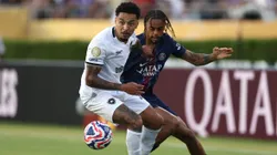 PASADENA, CALIFORNIA - JUNE 19: Gregore #26 of Botafogo is challenged by Bradley Barcola #29 of Paris Saint-Germain during the FIFA Club World Cup 2025 group B match between Paris Saint-Germain FC and Botafogo FR at Rose Bowl Stadium on June 19, 2025 in Pasadena, California. (Photo by Stu Forster/Getty Images)