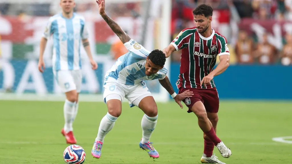 EAST RUTHERFORD, NEW JERSEY – JUNE 21: Erick Farias #97 of Ulsan HD battles for possession with Matheus Martinelli #8 of Fluminense FC during the FIFA Club World Cup 2025 group F match between Fluminense FC and Ulsan HD FC at MetLife Stadium on June 21, 2025 in East Rutherford, New Jersey. (Photo by Francois Nel/Getty Images)