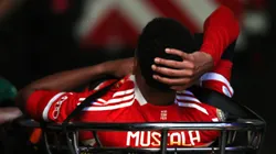 ATLANTA, GEORGIA - JULY 05: Jamal Musiala #42 of FC Bayern Munchen is carted from the pitch by medical staff following an injury during the FIFA Club World Cup 2025 quarter-final match between Paris Saint-Germain and FC Bayern München at Mercedes-Benz Stadium on July 05, 2025 in Atlanta, Georgia. (Photo by Kevin C. Cox/Getty Images)