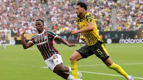 EAST RUTHERFORD, NEW JERSEY - JUNE 17: Ramy Bensebaini #5 of Borussia Dortmund controls the ball against Jhon Arias #21 of Fluminense FC during the FIFA Club World Cup 2025 group F match between Fluminense FC and Borussia Dortmund at MetLife Stadium on June 17, 2025 in East Rutherford, New Jersey. (Photo by Francois Nel/Getty Images)