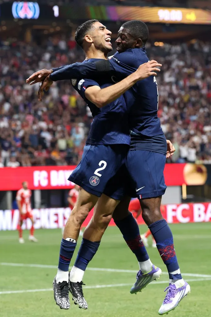 ATLANTA, GEORGIA – JULY 05: Ousmane Dembele #10 of Paris Saint-Germain celebrates scoring his team’s second goal with teammate Achraf Hakimi #2 during the FIFA Club World Cup 2025 quarter-final match between Paris Saint-Germain and FC Bayern München at Mercedes-Benz Stadium on July 05, 2025 in Atlanta, Georgia. (Photo by Kevin C. Cox/Getty Images)