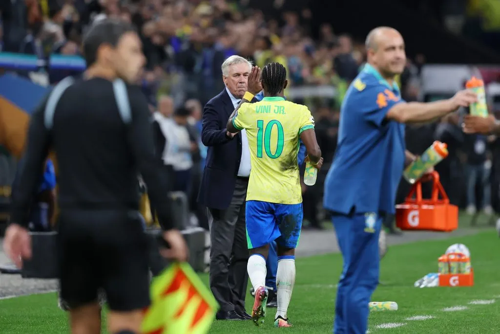 SAO PAULO, BRAZIL – JUNE 10: Vinicius Junior of Brazil celebrates with Carlo Ancelotti, Head Coach of Brazil, after scoring the team’s first goal during the FIFA World Cup 2026 South American Qualifier between Brazil and Paraguay at Neo Quimica Arena on June 10, 2025 in Sao Paulo, Brazil. (Photo by Wagner Meier/Getty Images)