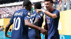 EAST RUTHERFORD, NEW JERSEY - JULY 09: Fabian Ruiz #8 of Paris Saint-Germain scores his team's first goal with teammate Ousmane Dembele during the FIFA Club World Cup 2025 semi-final match between Paris Saint-Germain and Real Madrid CF at MetLife Stadium on July 09, 2025 in East Rutherford, New Jersey. (Photo by Buda Mendes/Getty Images)