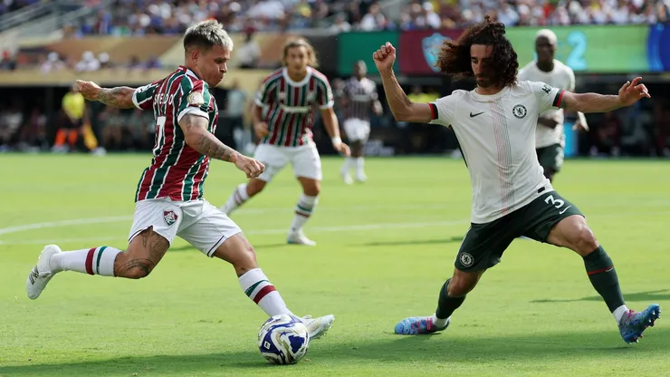 EAST RUTHERFORD, NEW JERSEY - JULY 08: Yeferson Soteldo #7 of Fluminense FC shoots against Marc Cucurella #3 of Chelsea FC during the FIFA Club World Cup 2025 semi-final match between Fluminense FC and Chelsea FC at MetLife Stadium on July 08, 2025 in East Rutherford, New Jersey. (Photo by Al Bello/Getty Images)