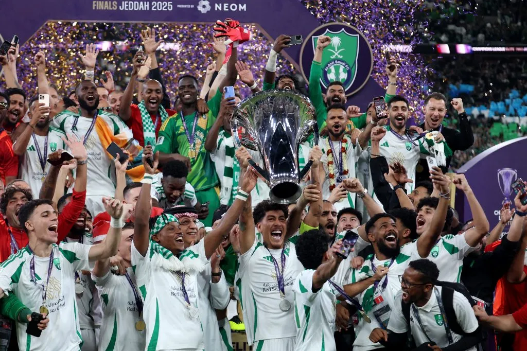 JEDDAH, SAUDI ARABIA – MAY 03: Roberto Firmino of Al-Ahli Saudi lifts The AFC Champions League Elite trophy after his teams 2-0 victory following the AFC Champions League Elite Final between Al Ahli and Kawasaki Frontale at the King Abdullah Sports City Hall Stadium on May 03, 2025 in Jeddah, Saudi Arabia. (Photo by Yasser Bakhsh/Getty Images)