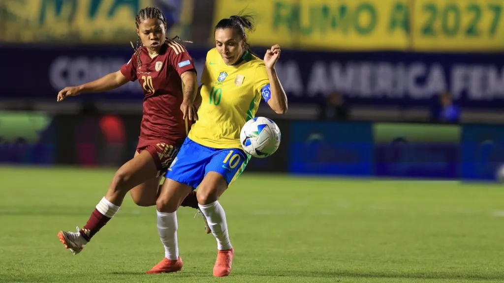 QUITO, ECUADOR – JULY 13: Marta Vieira of Brazil battles for possession against Dayana Rodriguez of Venezuela during the CONMEBOL Copa America Femenina 2025 match between Brazil and Venezuela at Estadio Gonzalo Pozo Ripalda on July 13, 2025 in Quito, Ecuador. (Photo by Franklin Jacome/Getty Images)