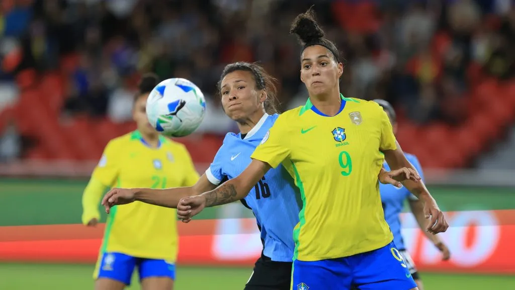 QUITO, ECUADOR – JULY 29: Amanda Gutierres of Brazil battles for possession against Yannel Correa of Uruguay during the CONMEBOL Copa America Femenina 2025 Semifinal match between Brazil and Uruguay at Rodrigo Paz Delgado Stadium on July 29, 2025 in Quito, Ecuador.  (Photo by Franklin Jacome/Getty Images)
