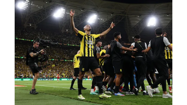 JEDDAH, SAUDI ARABIA - MAY 30: Fabinho of Al-Ittihad celebrates after Karim Benzema of Al-Ittihad (obscured) scores his team's third goal during the Final King's Cup match between Al Ittihad and Al Qadsiah at King Abdullah Sports City on May 30, 2025 in Jeddah, Saudi Arabia. (Photo by Yasser Bakhsh/Getty Images)