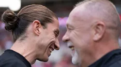 Filipe Luís e Mano Menezes. Foto: Jorge Rodrigues/AGIF.