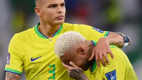AL RAYYAN, QATAR - DECEMBER 09: Neymar of Brazil reacts with Thiago Silva (L) and Dani Alves after the loss via a penalty shootout during the FIFA World Cup Qatar 2022 quarter final match between Croatia and Brazil at Education City Stadium on December 09, 2022 in Al Rayyan, Qatar. (Photo by Laurence Griffiths/Getty Images)