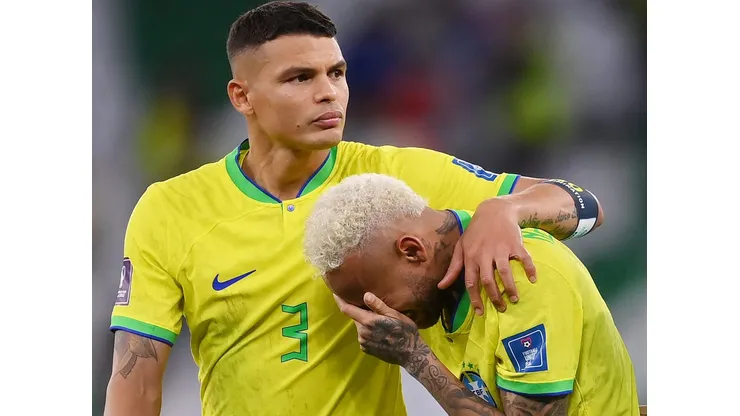 AL RAYYAN, QATAR - DECEMBER 09: Neymar of Brazil reacts with Thiago Silva (L) and Dani Alves after the loss via a penalty shootout during the FIFA World Cup Qatar 2022 quarter final match between Croatia and Brazil at Education City Stadium on December 09, 2022 in Al Rayyan, Qatar. (Photo by Laurence Griffiths/Getty Images)