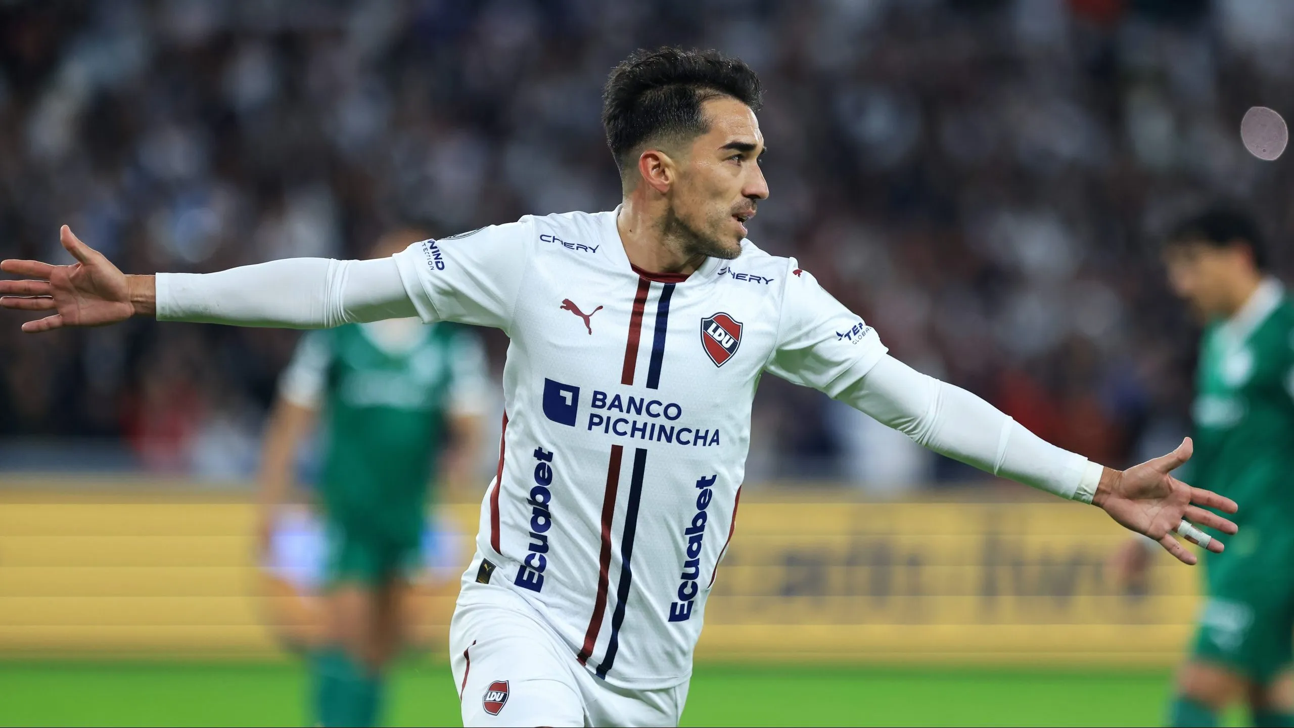QUITO, ECUADOR – OCTOBER 23: Lisandro Alzugaray of LDU de Quito celebrates after scoring the team’s second goal via penalty during the Copa CONMEBOL Libertadores 2025 first-leg semifinal match between LDU Quito and Palmeiras at Rodrigo Paz Delgado Stadium on October 23, 2025 in Quito, Ecuador. (Photo by Franklin Jacome/Getty Images)