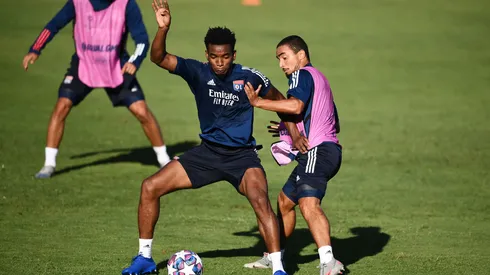 LISBON, PORTUGAL - AUGUST 18: Thiago Mendes of Olympique Lyon trains with Rafael of Olympique Lyon during a training session ahead of their UEFA Champions League Semi Final match against Bayern Munich at Estadio do Restelo on August 18, 2020 in Lisbon, Portugal. (Photo by Franck Fife/Pool via Getty Images)