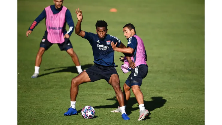 LISBON, PORTUGAL - AUGUST 18: Thiago Mendes of Olympique Lyon trains with Rafael of Olympique Lyon during a training session ahead of their UEFA Champions League Semi Final match against Bayern Munich at Estadio do Restelo on August 18, 2020 in Lisbon, Portugal. (Photo by Franck Fife/Pool via Getty Images)