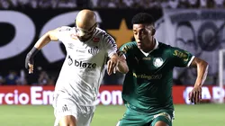 SP - SANTOS - 22/01/2025 - PAULISTA 2025, SANTOS X PALMEIRAS - Thaciano jogador do Santos disputa lance com jogador do Palmeiras durante partida no estadio Vila Belmiro pelo campeonato Paulista 2025. Foto: Marcello Zambrana/AGIF