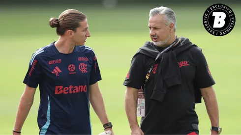 Filipe Luís e José Boto conversando durante a preparação do Flamengo para a Libertadores