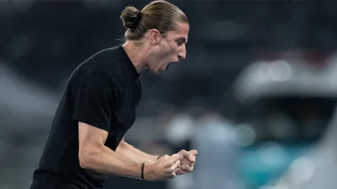 Filipe Luís teve méritos no crescimento do uruguaio. Foto: Jorge Rodrigues/AGIF