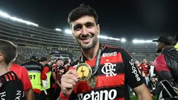 LIMA, PERU - NOVEMBER 29: Giorgian de Arrascaeta of Flamengo celebrates with winner's medal after the 2025 Copa CONMEBOL Libertadores Final match between Palmeiras and Flamengo at Estadio Monumental on November 29, 2025 in Lima, Peru. (Photo by Rodrigo Valle/Getty Images)