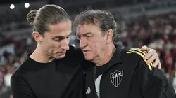 Filipe Luís e Cuca. Foto: Thiago Ribeiro/AGIF