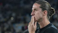 Filipe Luís tem baixas no Flamengo para encarar o Cruz Azul - Foto: Thiago Ribeiro/AGIF