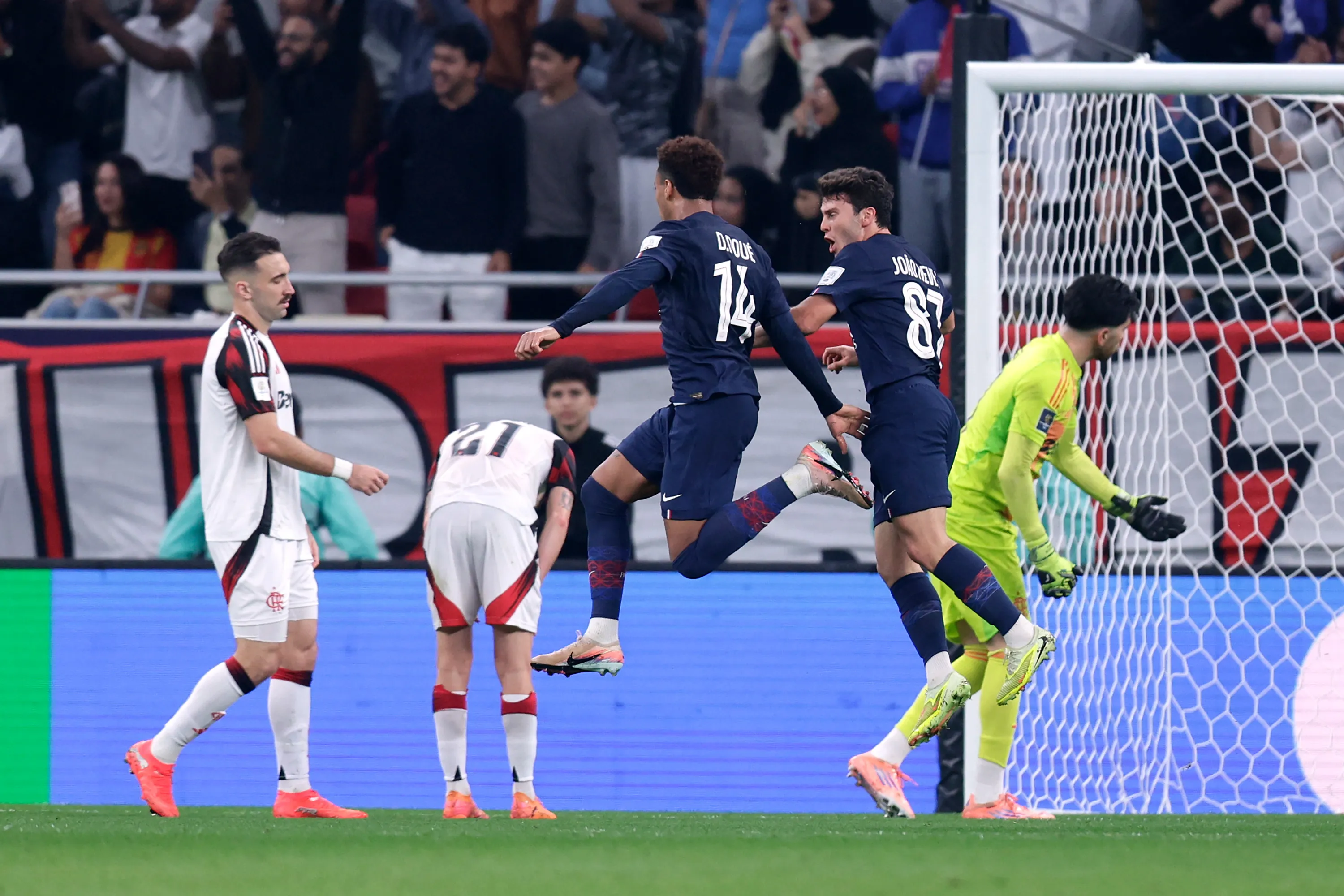 DOHA, QATAR – DECEMBER 17: Desire Doue and Joao Neves of Paris Saint-Germain celebrate their team’s first goal, scored by teammate Khvicha Kvaratskhelia  during the FIFA Intercontinental Cup 2025 final match between Paris Saint-Germain and CR Flamengo at Ahmad Bin Ali Stadium on December 17, 2025 in Doha, Qatar.  (Photo by Getty Images/Getty Images)
