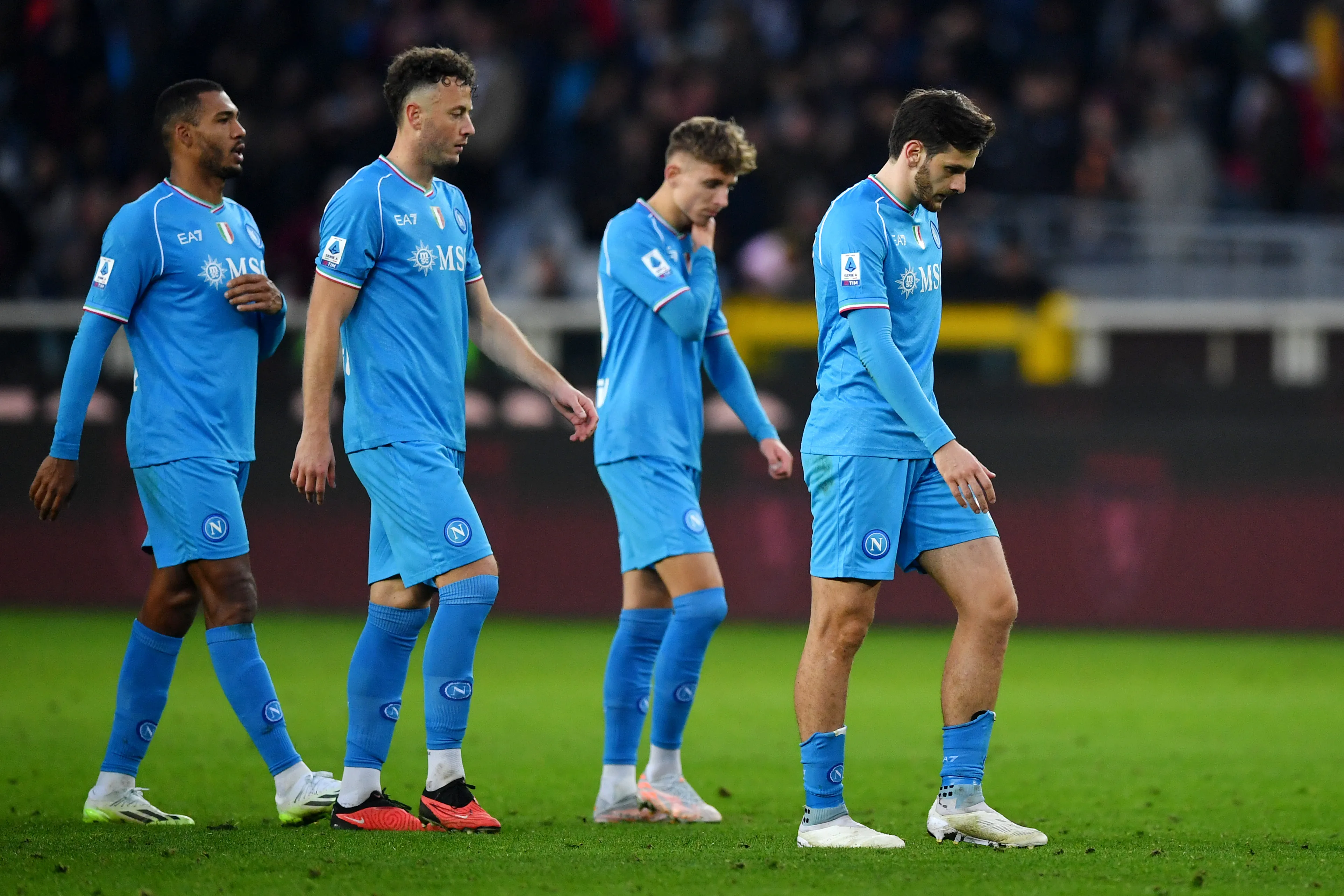 TURIN, ITALY – JANUARY 07: Amir Rrahmani (2L) and Khvicha Kvaratskhelia of SSC Napoli (R) look dejected after the team’s defeat in the Serie A TIM match between Torino FC and SSC Napoli at Stadio Olimpico di Torino on January 07, 2024 in Turin, Italy. (Photo by Valerio Pennicino/Getty Images)